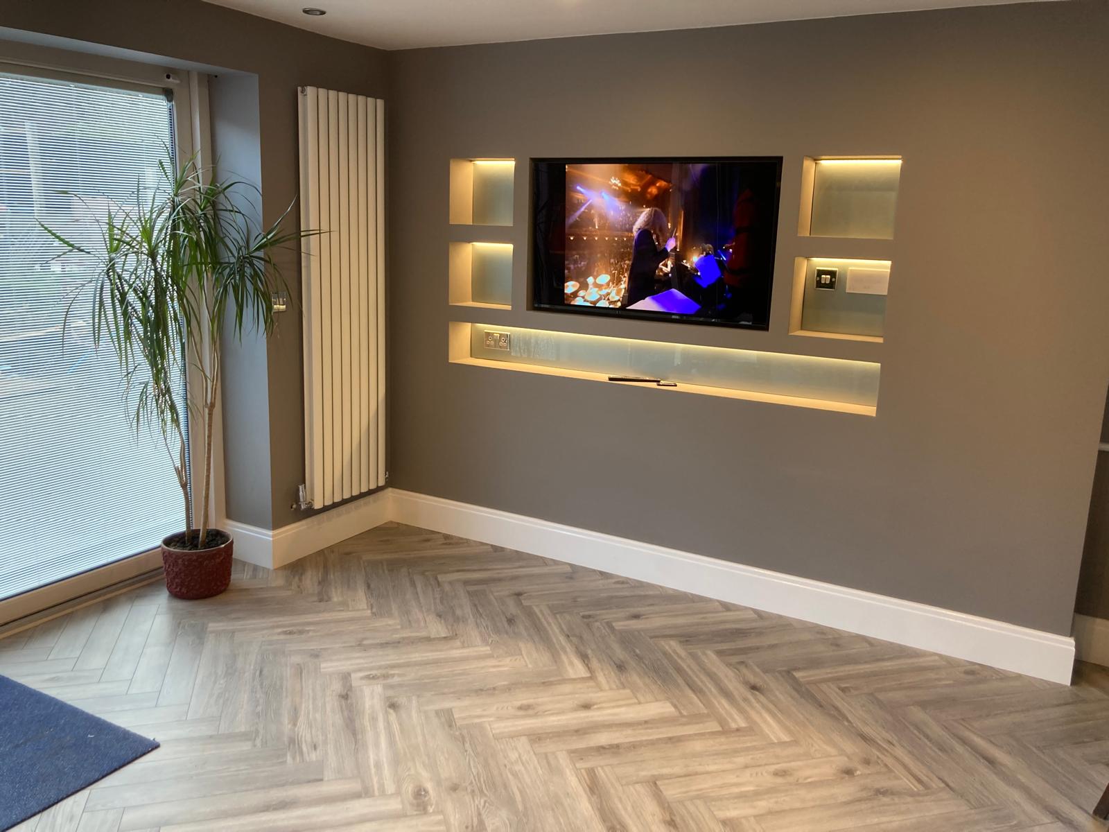 Hidden sockets and outlets in media wall